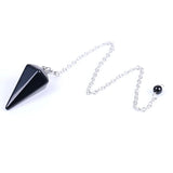 Pink Quartz Crystal Pendulum for dowsing, divination, and energy work.