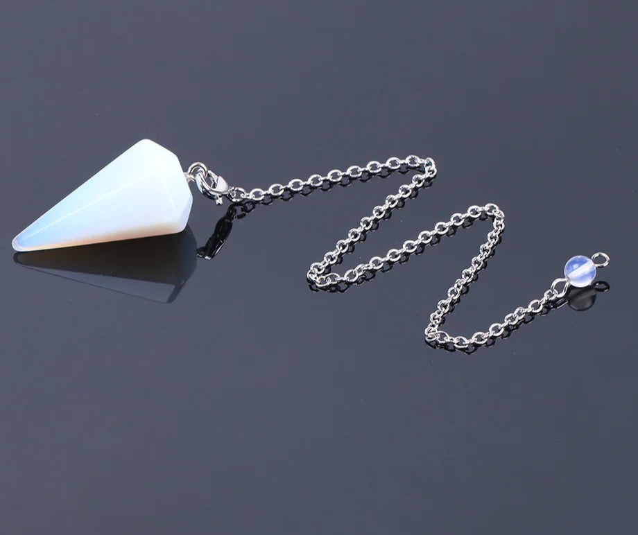 Pink Quartz Crystal Pendulum for dowsing, divination, and energy work.