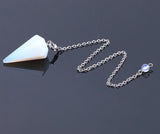 Pink Quartz Crystal Pendulum for dowsing, divination, and energy work.