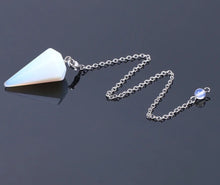 Pink Quartz Crystal Pendulum for dowsing, divination, and energy work.