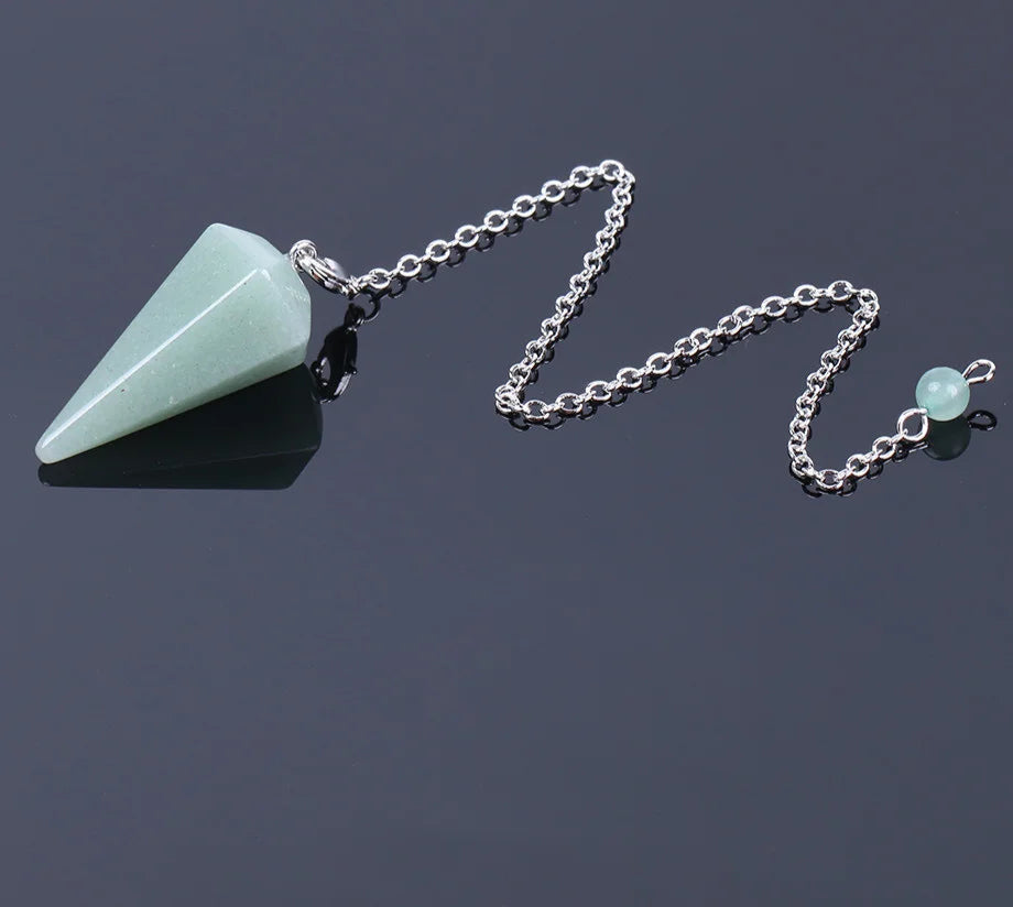 Pink Quartz Crystal Pendulum for dowsing, divination, and energy work.
