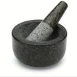 Polished granite mortar and pestle set for grinding spices, herbs, and seasoning blends in the kitchen.