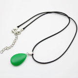 Polished natural stone water-drop pendant for outfit styling, crystal-inspired fashion, and personal wear.