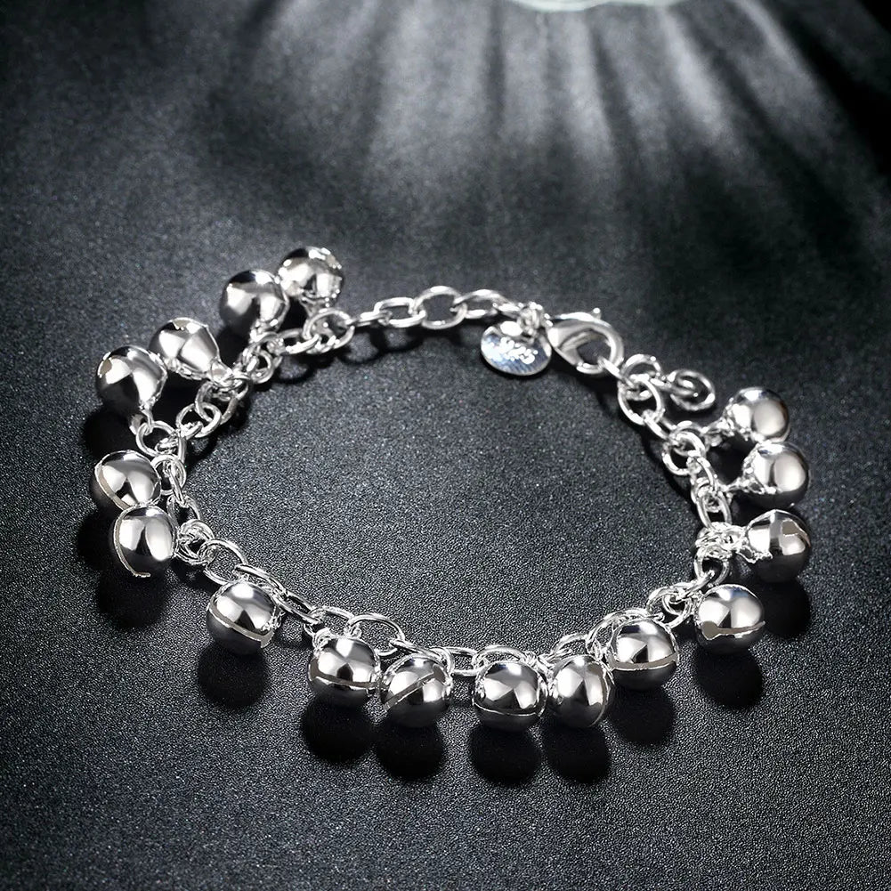 Polished twisted rope bracelet in 925 silver for wrist accessorizing, dressy styling, and regular jewelry wear.