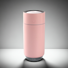Lightweight and portable air humidifier device for desk use, personal air moisture, and workspace comfort.