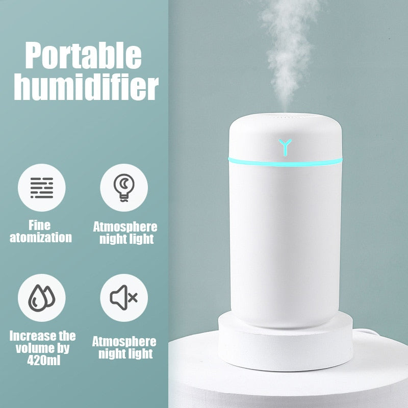 Portable USB humidifier essential oil diffuser for personal air hydration and aromatherapy use at home or in the office.