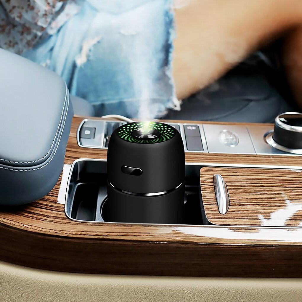 Portable USB mini humidifier air diffuser with LED color light for desk use, personal moisture, and relaxing room fragrance.