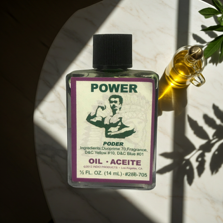 Power Wish Oil ritual oil bottle for manifestation work, prayer, and spiritual practice.