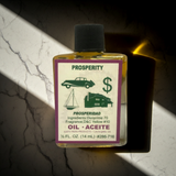 Prosperity Wish Oil bottle for money drawing spells, prosperity prayer, and manifestation practice.