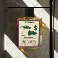 Prosperity Wish Oil anointing oil bottle for luck work, prosperity rituals, and spiritual blessing.