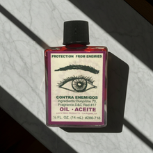 Protection From Enemies Wish Oil anointing oil bottle for blessing, protection rituals, and warding off negativity.