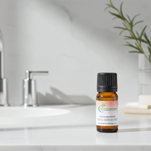 Pure Cypress Essential Oil dropper bottle for massage oil blending, warming comfort, and self-care routines.