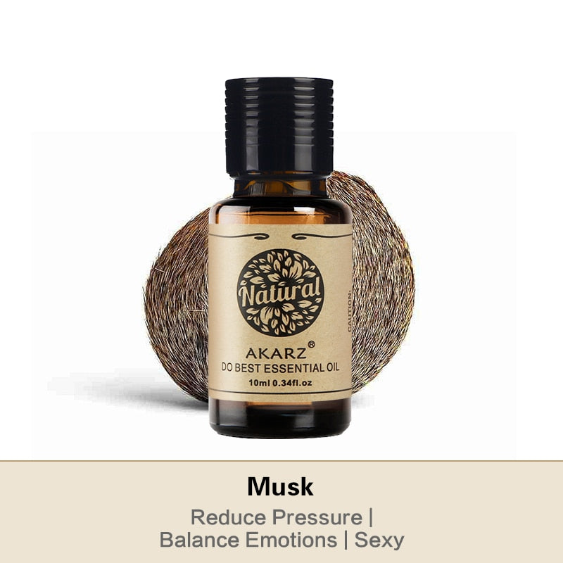 Akarz essential oil bottle with a coconut on a white background