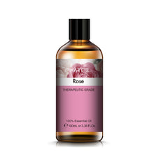 PHATOIL rose essential oil in a 100ml amber glass bottle with a black screw cap and printed rose label.