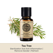 Akarz Tea Tree essential oil bottle with green leaves on a white background