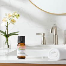 White camphor essential oil dropper bottle for respiratory comfort, muscle relief massage blends, and air purification.