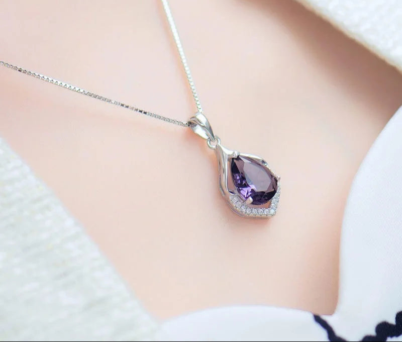 Purple gemstone teardrop pendant necklace with elegant stone charm for weddings, formal events, and stylish everyday use.