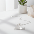 Quartz pendulum divination tool for dowsing, energy reading, and spiritual guidance.
