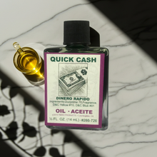 Quick Cash Wish Oil ritual oil bottle for prosperity spells, altar work, and financial intention setting.