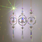 Rainbow Hamsa crystal prism hanging sun catcher for window decor, light reflection, and meditation space styling.