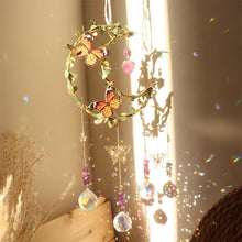 Rainbow Maker crystal wind chime suncatcher with dangling prism accents for brightening windows, casting colorful light, and decorative home use.
