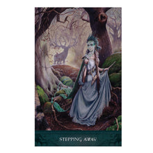 Raven's Wand Oracle cards spread out for divination practice and card study.