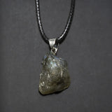 Raw purple amethyst stone pendant with natural crystal texture for prayer, energy cleansing, and everyday jewelry styling.