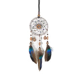 Rearview mirror dream catcher with natural feathers for car interior decoration, energy balance, and protective travel use.
