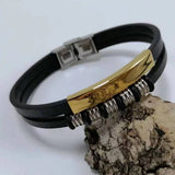 Red black gothic leather cuff bracelet for dark fashion looks, nightlife wear, and statement accessory use.