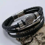 Red black leather cuff bracelet for goth fashion, themed events, and everyday alternative wardrobe use.