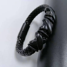 Red black leather cuff bracelet for punk look styling, rock-themed outfits, and statement fashion wear.