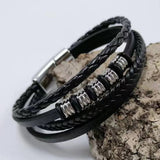 Red black punk rock leather cuff bracelet for concert outfits, alternative fashion, and bold wrist accessory styling.