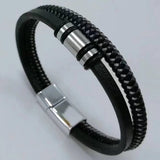 Red black rebel style leather cuff bracelet for punk-inspired fashion, concert wear, and bold personal styling.