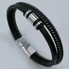 Red black rebel style leather cuff bracelet for punk-inspired fashion, concert wear, and bold personal styling.