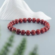 Red Jasper gemstone bracelet for meditation, mindfulness sessions, and spiritual balance.