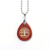 Red Jasper gemstone Tree of Life pendant with chain for spiritual jewelry wear, energy work, and daily fashion use.