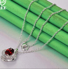Red zircon bud pendant in 925 sterling silver for dressy accessorizing, gift giving, and casual jewelry wear.