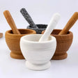 Resin mortar and pestle herb and spice grinder set for grinding dried herbs, spices, and seasoning blends.