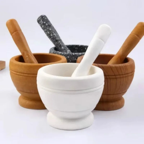 Resin mortar and pestle herb and spice grinder set for grinding dried herbs, spices, and seasoning blends.