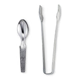Resin and powder tong and spoon set close-up detail of metal tools for altar and incense use.
