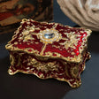 Retro European metal jewelry box trinket case for storing rings, earrings, and small keepsakes.