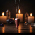 Rhodochrosite 6-sided faceted pendulum on a 9-inch chain for dowsing