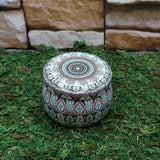 Ritual spell tin candle with crystals for spellwork, manifestation, and ceremonial use.
