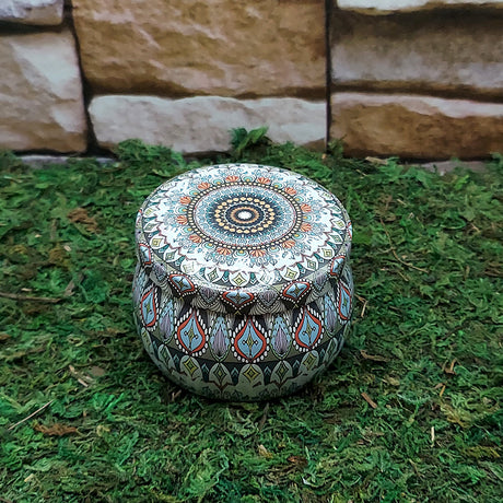 Ritual spell tin candle with crystals for spellwork, manifestation, and ceremonial use.
