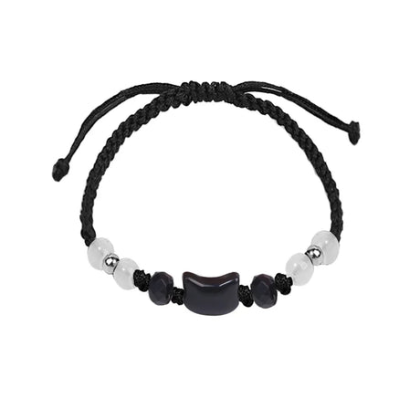 Moonstone and obsidian romantic cat bracelet pair for couples, Valentine gifting, and meaningful matching jewelry wear.