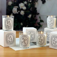 Romantic transparent scented candle in glass jar for home décor, relaxation, and ambient fragrance use.