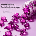 Rose Essence Hair Serum Capsules bottle with rose essential oil revitalization and repair label on pink background.