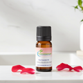 Rose essential oil bottle for luxurious floral aromatherapy, emotional support diffusing, and skin care blending.