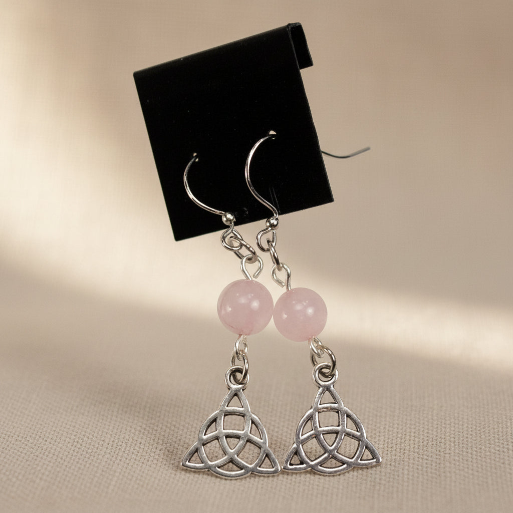 Rose quartz triquetra earrings for Celtic-inspired jewelry, everyday wear, and gift giving.