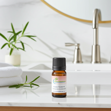 Rosemary essential oil bottle for focus-supporting aromatherapy, hair care blending, and invigorating diffuser use.